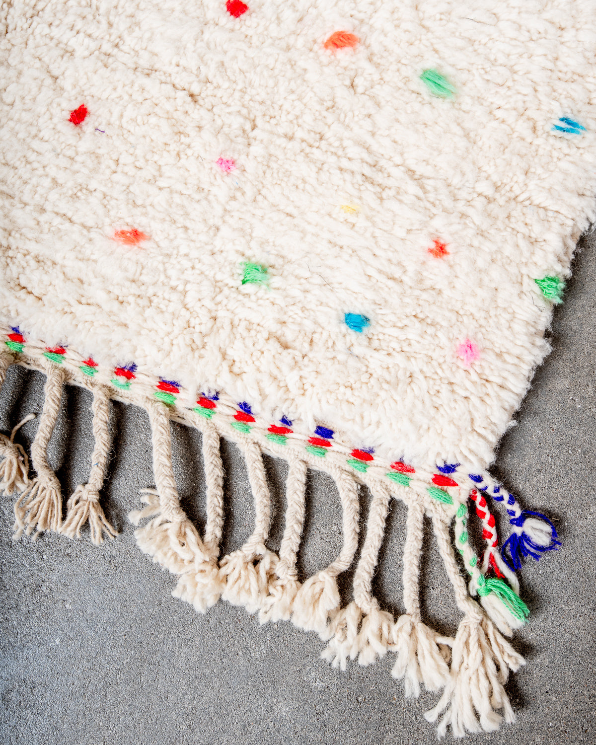 Modern, designer, handcrafted Berber rug from Morocco. Beniourain carpet with beautiful colours and patterns and fluffy wool texture.